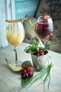 Refreshing sangria or punch with fruits in glass and pincher jpg Royalty Free Stock Photo