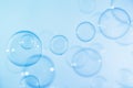 Refreshing of Soap Suds, Bubbles Water. Beautiful Transparent Blue Soap Bubbles Floating in The Air Royalty Free Stock Photo