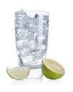 Refreshing soda water with ice cubes in glass and cut lime isolated on white Royalty Free Stock Photo
