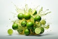 Lime slices falling with splashes of water on a white background Royalty Free Stock Photo