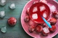 Refreshing strawberry ice drink, frozen strawberry. Top view, selective focus.