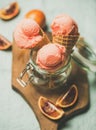 Refreshing summer blood orange ice cream on wooden board Royalty Free Stock Photo