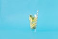 Refreshing summer cocktail lemon mint blue background Royalty Free Stock Photo