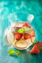 Refreshing summer drink with strawberry cucumber lime in jar Royalty Free Stock Photo