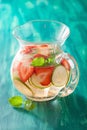 Refreshing summer drink with strawberry cucumber lime in jar Royalty Free Stock Photo