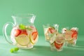 Refreshing summer drink with strawberry cucumber lime in jar and Royalty Free Stock Photo