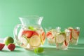 Refreshing summer drink with strawberry cucumber lime in jar and Royalty Free Stock Photo