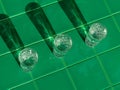 Refreshing summer drinks in crystal glasses on yellow bar tile background with harsh shadows Sweet cold natural cocktail