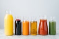 Refreshing summer drinks. Orange, carrot, apple, tomato, spinach and pomegranate juice in glass jars isolated over white Royalty Free Stock Photo