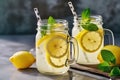 Refreshing Summer Lemonade in Mason Jars with Lemon Slices and Ice. created with Generative AI