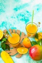 Refreshing summer mango and citrus freshly squeezed juice.