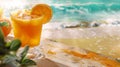 Refreshing Summer Orange Drink by the Beach Royalty Free Stock Photo