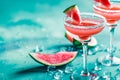 Refreshing summer watermelon cocktails. Glasses rimmed with sugar filled with a pink watermelon drink. Generative AI Royalty Free Stock Photo