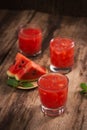 Refreshing summer watermelon juice in glasses with slices of watermelon Royalty Free Stock Photo