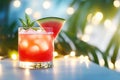 Refreshing watermelon cocktail with ice and mint on a sunny tropical background Royalty Free Stock Photo