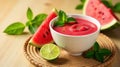 Refreshing watermelon gazpacho with lime and mint garnish in a white bowl. Generative AI Royalty Free Stock Photo