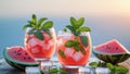 Refreshing Watermelon Symphony Chill Summer Drinks with Mint and Ice on sunrise light blue background. Royalty Free Stock Photo