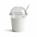 Refreshing white milkshake in a clear plastic cup with a dome lid and straw Royalty Free Stock Photo