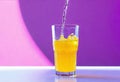 refreshing yellow carbonated drink in a tall glass. Cold glass, drops of condensation, orange juice, lemon juice, Royalty Free Stock Photo