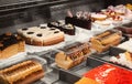 Refrigerated display case with delicious desserts in supermarket