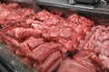 Refrigerated display case with fresh meat in butcher shop Royalty Free Stock Photo