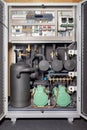 Refrigeration equipment of a compressor-condenser station with an electronic controller unit Royalty Free Stock Photo