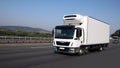 Refrigeration truck is driving on highway Royalty Free Stock Photo