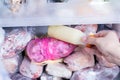 Refrigerator with frozen food. Frozen milk. Open fridge freezer meat, milk, vegetables. Royalty Free Stock Photo