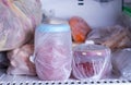 Refrigerator with frozen food meat, milk, vegetables Royalty Free Stock Photo