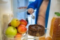 Refrigerator with nice tasteful chocolate cake is big ordeal for