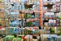 Refrigerator shelf with packages of yoghurt of various brands for sale