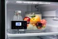 refrigerator with temperature probe and alarm, ensuring food safety Royalty Free Stock Photo