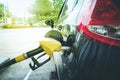 Refuel the pump in car at gas station. Royalty Free Stock Photo