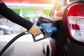 Refueling the car at a gas station fuel pump Royalty Free Stock Photo