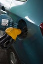 Refueling the fuel tank of the vehicle with diesel or gasoline at a filling station Royalty Free Stock Photo