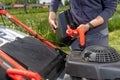 Refueling the motor lawn mower Royalty Free Stock Photo