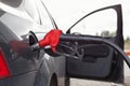 Refueling nozzle in the car