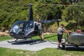 Refueling a Robinson R44 Raven II helicopter.