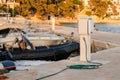 Refueling yachts with water on sailboat dock in sea coast. Royalty Free Stock Photo