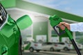Refuelling car with bio fuel. Carbon neutral transortation Royalty Free Stock Photo