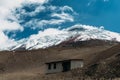 A refuge juxtapositioned against the Cotopaxi volcano in Ecuador, South America