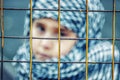 A refugee girl from the east in a headscarf Royalty Free Stock Photo