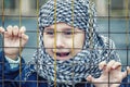 A refugee girl from the east in a headscarf Royalty Free Stock Photo