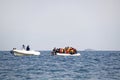 Refugees arriving in Greece in dinghy boat from Turkey. Royalty Free Stock Photo