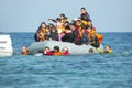 Refugees arriving in Greece in dinghy boat from Turkey. Royalty Free Stock Photo