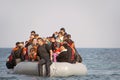 Refugees arriving in Greece in dinghy boat from Turkey. Royalty Free Stock Photo