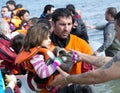 Refugees arriving in Greece in dinghy boat from Turkey. Royalty Free Stock Photo