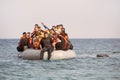 Refugees arriving in Greece in dinghy boat from Turkey. Royalty Free Stock Photo