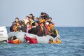 Refugees arriving in Greece in dinghy boat from Turkey. Royalty Free Stock Photo