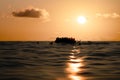 Ship with refugees on board requiring help. Sea with people in the water asking for help. Migrants crossing the sea Royalty Free Stock Photo